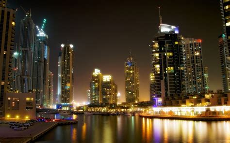 Wallpaper Dubai Sea Beach Buildings Skyscrapers Night 1680x1050