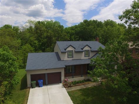 If you have a brick where the main color is red with splashes of other colors a blue roof looks good. GAF Timberline HD Lifetime Roofing System with Biscayne ...