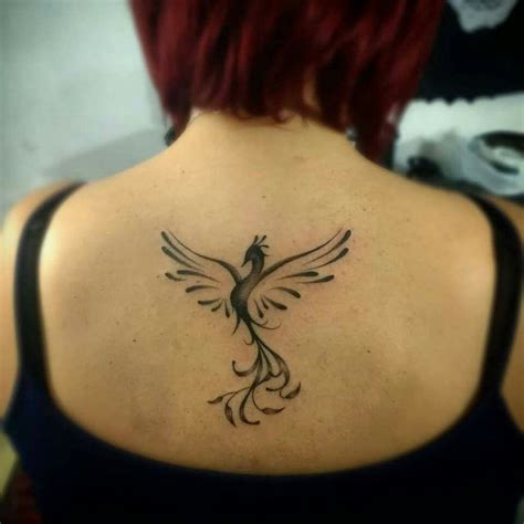 And Still I Rise Soft Phoenix Back Tattoo Designs For Women
