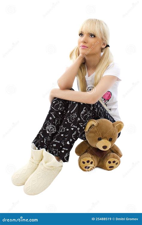 Charming Girl Wearing Pajamas With Teddy Bear Royalty Free Stock Images