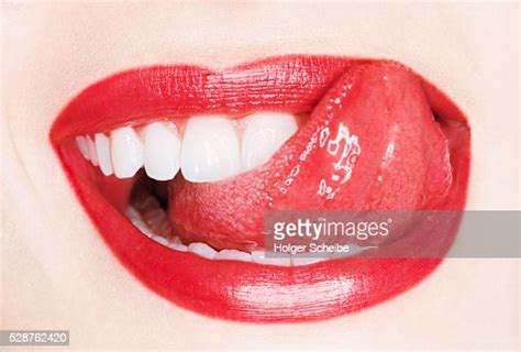 Young Woman Licking Lips Photo Getty Images