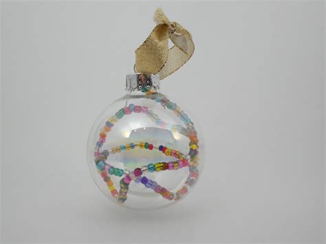 Maybe you would like to learn more about one of these? DIY Beaded Ornament Tutorial