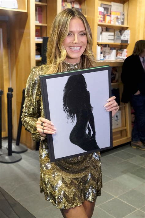 heidi klum gives the public what they want at the heidi klum by rankin book signing in nyc