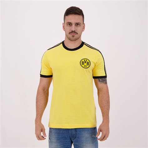 Quite a bit of black is present on the shoulders and sleeves of the og shirt as well as in the form of a horizontal stripe. Retromania Borussia Dortmund 1989 T-Shirt