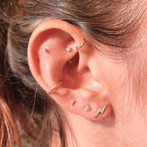 Ear Curation On Instagram Rook Forward Helix Flat Conch And Triple