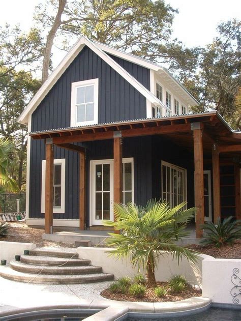 The pros of going vertical. Vertical siding with metal roof | Modern farmhouse ...