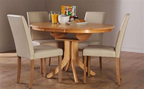 The clover table, a smaller 50 model of the expanding round table, has only 4 leaves and starts at $22,000. Home Priority: Outstanding Round Expandable Dining Table ...