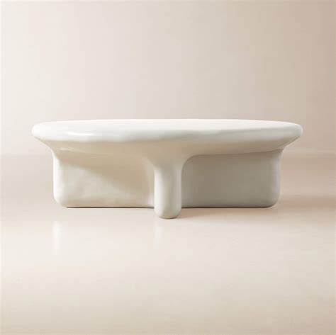 Bodene Round Ivory Resin Coffee Table + Reviews | CB2