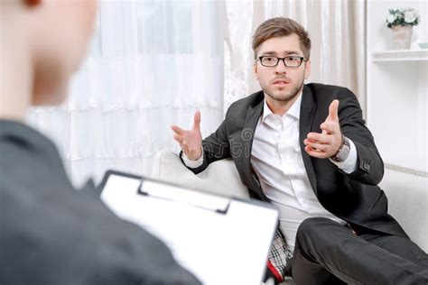 Young Man With His Psychologist Stock Image Image Of Consultation