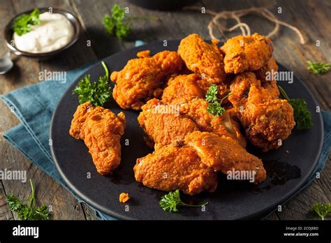 Spicy Deep Fried Breaded Chicken Wings With Ranch Stock Photo Alamy