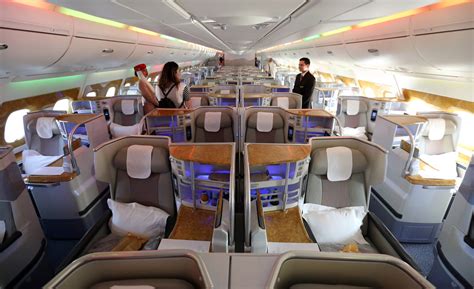The new singapore airlines business class seats now recline fully at the touch of a button, while offering more legroom in the flatbed position. A380 visits Chicago: Will jet with 2 decks, first-class ...