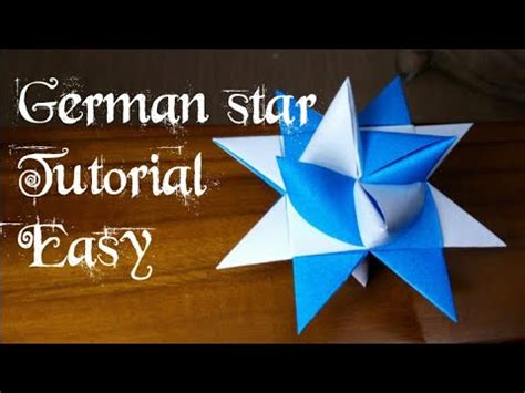 Now make a knot near one end of the strip, as shown in the next. (1) How to make german star tutorial || easy origami paper star ||traditional freobel star maki ...