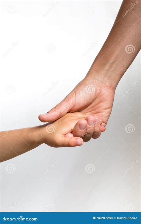 Womanand X27s Hand Holding A Childand X27s Hand Stock Photo Image Of