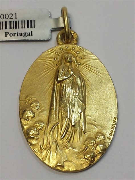 Em declarações à rtp, pichardo disse que representar portugal e ter o prazer de ser acolhido por portugal é um privilégio. Medalhas Religiosas Ouro 19,2Kts - A sua Ourivesaria ...