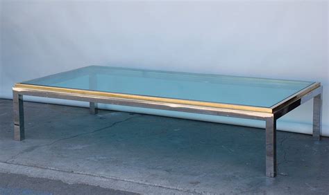 Use these simple round coffee table styling ideas to add a cozy touch to your home. Large chrome, brass and glass 70's coffee table by Willy ...