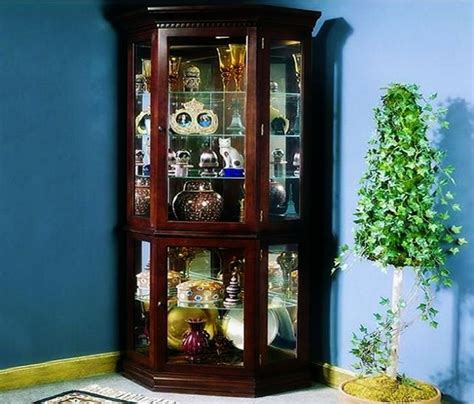 A glass shelf is impervious to moisture and easy to the door elements and storage boxes ensure that things are neat and tidy. Corner Cherry Curio Shelf With Glass Doors : Furniture ...