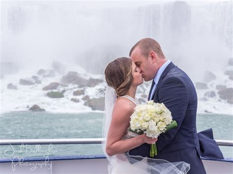 Romantic Niagara Falls Elopement The Bride And Groom Kissing At