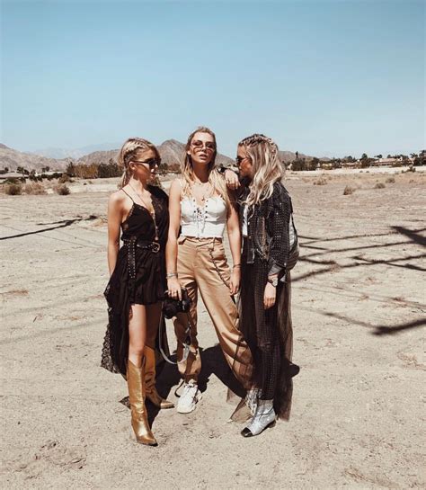 Three Women Standing Together In The Desert