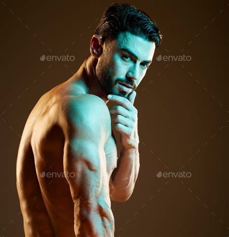 Sexy Muscular And Portrait Of A Man In A Studio With A Hot Sensual