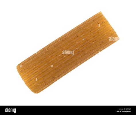 Top View Of A Single Tube Shaped Whole Wheat Rigatoni Pasta Isolated On