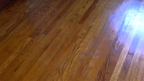 Let me talk you out of staining your floors. Refinishing hard wood flooring with Zar stain and water ...