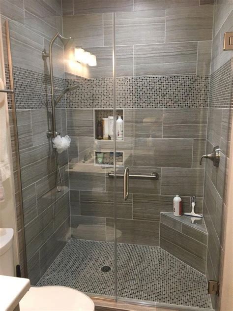 12 X 24 Tile On The Shower Walls With A Glass And Stone Mosaic Used