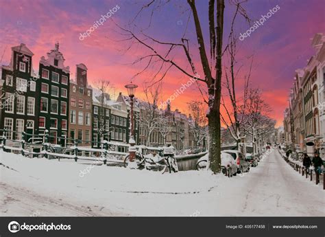 City Scenic Snowy Amsterdam Netherlands Sunset Stock Photo By ©nilaya