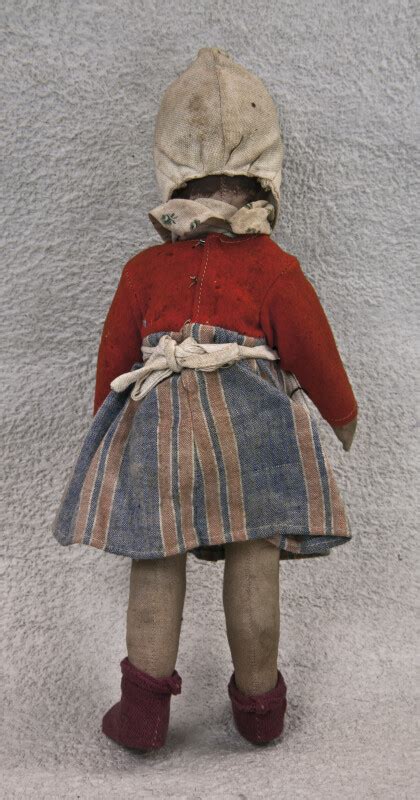 Netherlands Antique Dutch Doll Wearing White Cap And Apron Back View