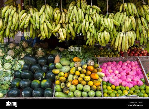 Fresh Fruit For Sale On A Street Market In Kumila Kerala India Stock