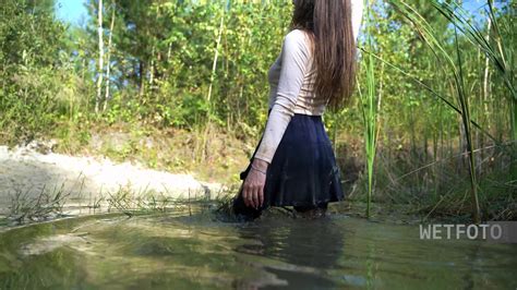 Hot Girl In Skirt And Pantyhose Gets Wet And Swims At The Lake