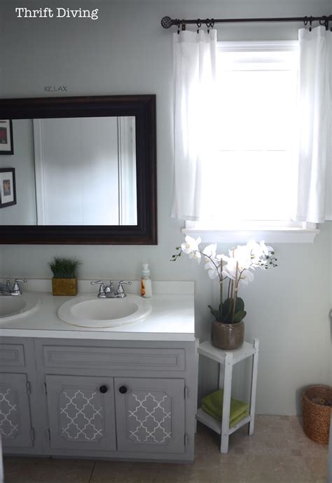 Painting a bathroom vanity is an easy way to update your bathroom without spending a lot of money. BEFORE & AFTER: My Pretty Painted Bathroom Vanity