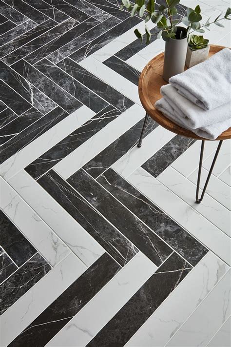 Marble bathroom floors with mat design pattern. Ador Marble Effect Tiles | Floor pattern design, Marble ...