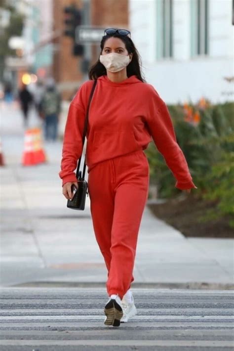 Olivia Munn In A Red Sweatsuit Was Seen Out In Santa Monica 11242020