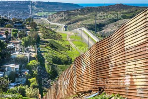The Long And Degraded Iron Wall On The Usmexico Border In Tijuana In