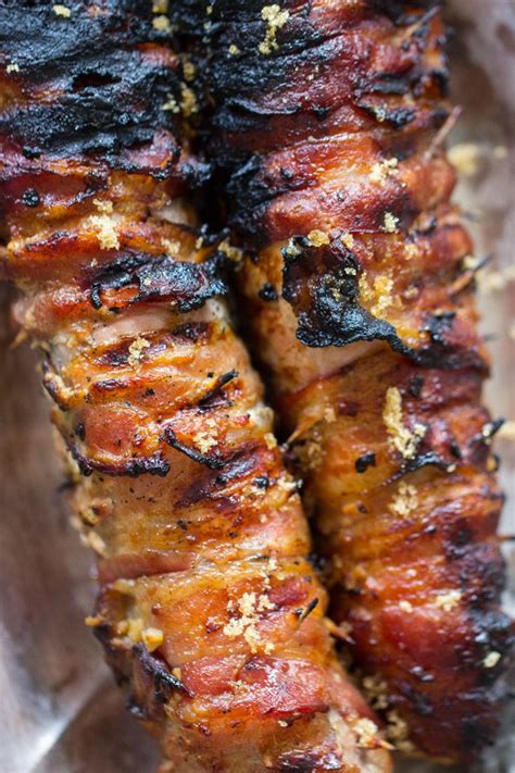 Then fold in both open ends twice to seal. Bacon-Wrapped Pork Tenderloin recipe image ...