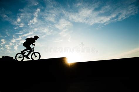 Man Riding A Bicycle At Sunset Stock Photo Image Of Fitness Outdoor