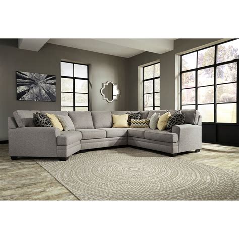 One of the best seating options is a leather reclining (manual or power) sectional sofa. Benchcraft by Ashley Cresson Contemporary 4-Piece Sectional with Cuddler | Royal Furniture ...