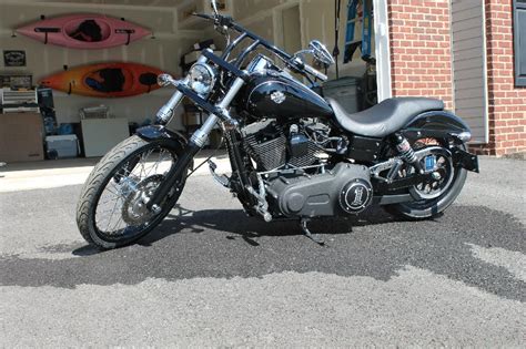 A beefy triple clamp provides an aggressive look and plenty of stiffness for confident handling. 2011 Harley-Davidson® FXDWG Dyna® Wide Glide® (Black ...