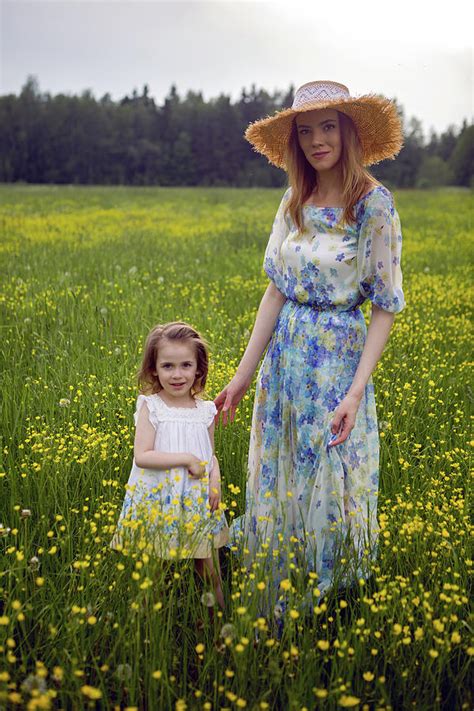 Mother And Daughter In Dresses And A Hat Stand Photograph By Elena