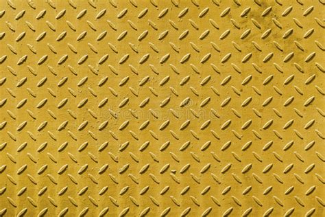 Pattern Of Old Metal Diamond Plate Yellow Metal Surface With Diamond