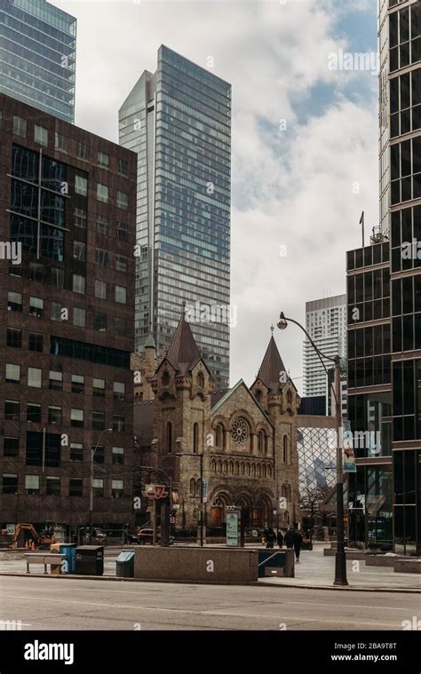 Old Church Among Modern Buildings In Downtown Toronto Canada Stock