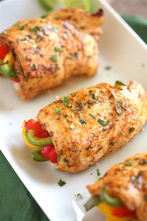 Stir in bell pepper, chiles and onion; Baked Chicken Fajita Roll-Ups - Eat Yourself Skinny