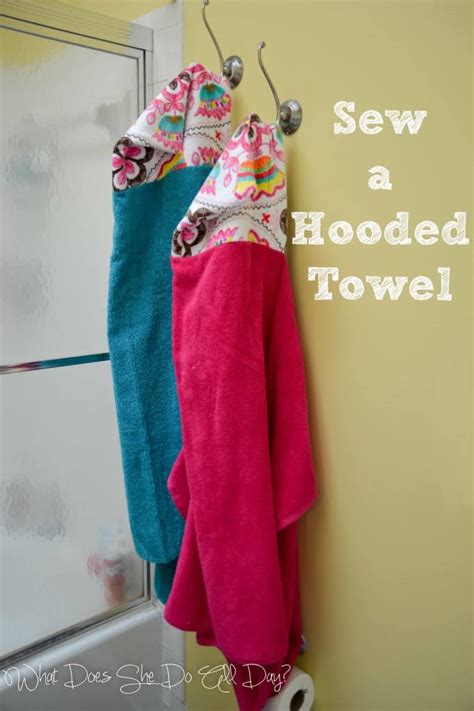 With the wrong side of the bath towel facing you, pin the hood in the center of the bath towel about 2″ down and overlapping with the bath towel. DIY Sewing Tutorials | Skip To My Lou