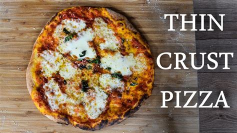 Thin And Crispy Pizza Recipe With Cheese And Tomato Sauce Roccbox
