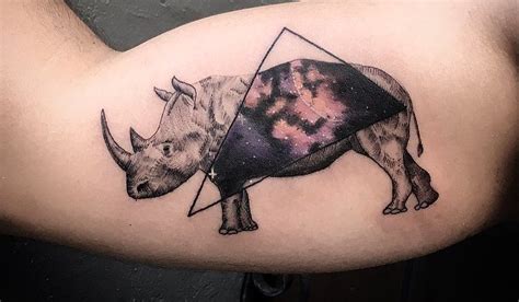 28 Creative Rhino Tattoo Designs And Ideas Tattoobloq Rhino Tattoo