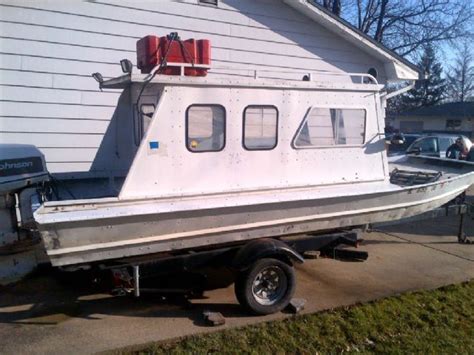 Perhaps the only downside to small cuddy cabins is the lack of an actual cabin itself for overnight stays. Image result for used metal cabin enclosure for jon boat ...