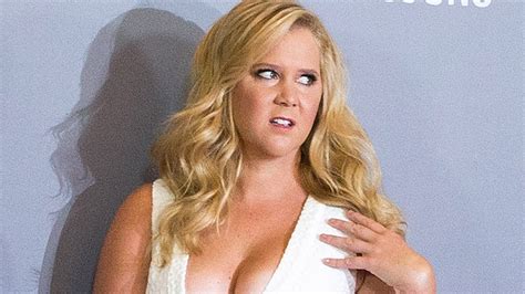 amy schumer shows major cleavage at trainwreck event like the look