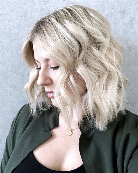 Use a flat iron to curl short hair with help from a stylist, arti. How to curl really short hair with a flat iron ...