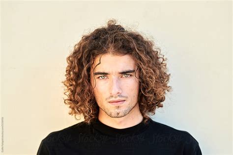 Handsome Man With Curly Hair By Stocksy Contributor Guille Faingold