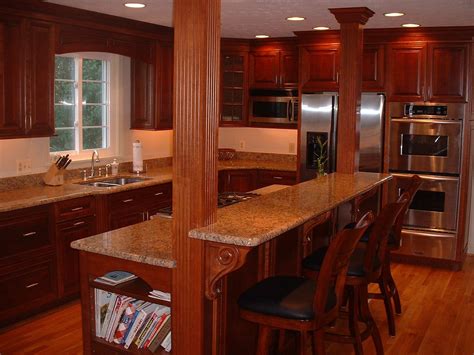 Kitchen island with granite top and seating. Bel Air Entertaining Kitchen and Wet Bar | Taylor Made ...